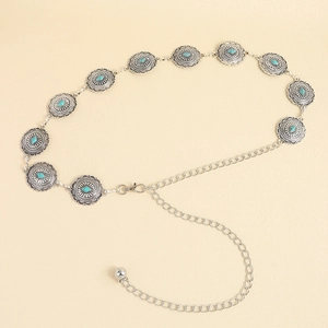 Détail de la chaîne de taille vintage en argent avec incrustations de turquoise et médaillons