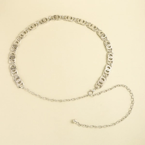 Detail view of silver metal waist chain featuring interlocking double loops and a lobster clasp
