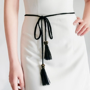 Fashionable black woven waist rope with long tassels and vintage bronze metal accents