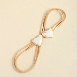 Cintura elastica in metallo dorato con fibbia a cuore bianco per abito donna