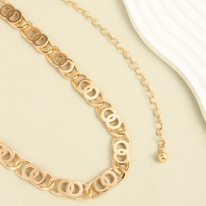 Elegant gold metal chain belt for women with hollow interlaced links and ball pendant