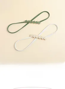 Elastic stretchable thin waist chain with gold floral buckle in green and white colors
