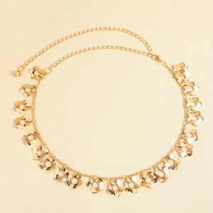 Detailed view of adjustable golden metal waist chain with elegant hollow flower pendants