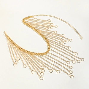 Detail of golden multilayer fringe body chain with tassel circles and lobster clasp