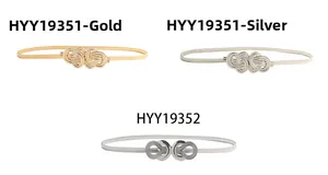 Detail view of thin metal chain belts with knot and infinity buckles in gold and silver