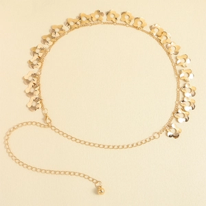 Close-up of golden layered waist chain with hollow plum blossom charms and tassels