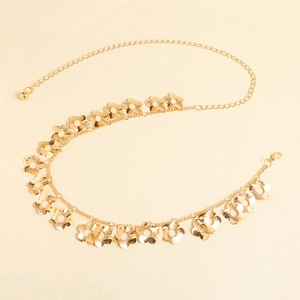 Elegant gold metal waist chain belt featuring hollow plum blossom floral pendants