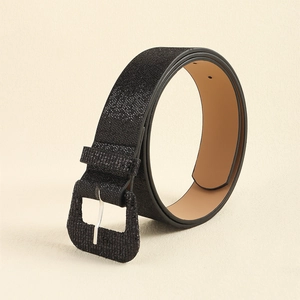 Detailed view of women's black Y2K sequined belt with square buckle and texture