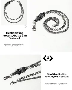 Detail of gunmetal punk pants chain with 360-degree rotating lobster clasp and skulls
