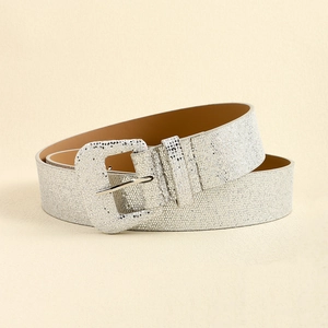Detailed close-up of shiny silver sequins and matching square buckle on the Y2K style belt