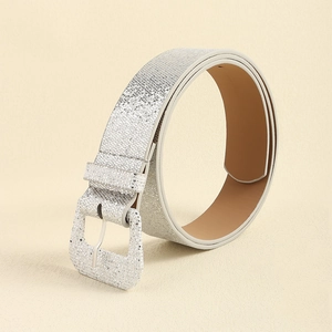 Close-up of Y2K style silver sequin belt with large square buckle and faux leather lining