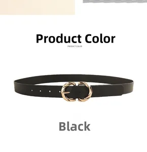 Close-up of interlocking gold D-buckle on a slim black leather belt with adjustment holes