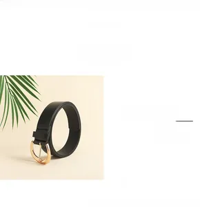 Detailed view of black leather belt with gold oval buckle showing dimensions 105 x 3.5 cm
