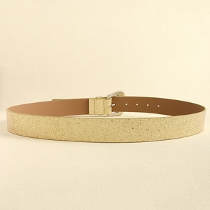 Detailed view of high-density gold sequin coating and metallic buckle on Y2K belt