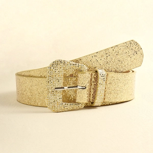 Detail of glittery gold Y2K belt with a metallic rectangular pin buckle for women