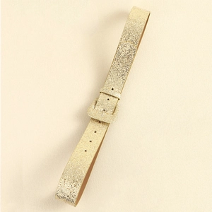Detailed view of champagne gold sequin belt with matching buckle for women Y2K style