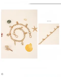 Détails de la chaîne de pantalon dorée avec pendentifs coquillages et étoiles de mer