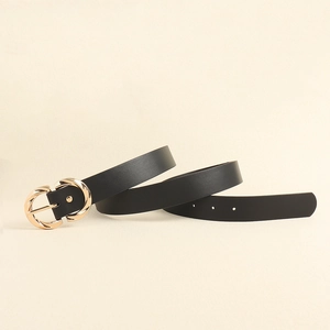 Detailed close-up of a premium black leather belt with elegant interlocking gold rings buckle
