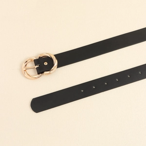 Detail of black leather belt featuring a golden double-loop knot buckle and adjustment holes
