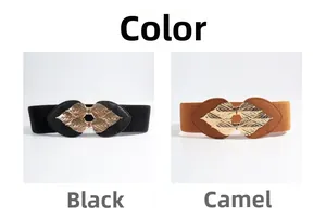 Detail view of elastic waist belts in black and camel colors with golden leaf buckles