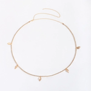 Detail of gold rhinestone body chain with small leaf pendants and adjustable lobster clasp