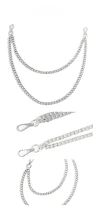 Detail view of double-layered silver curb chain belt with secure metal lobster clasps