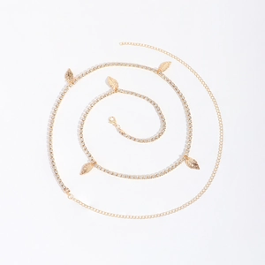 Golden waist chain with sparkling rhinestones and delicate leaf pendants for beach wear