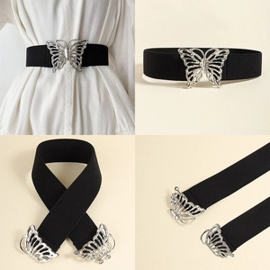 Detail showing wide black elastic corset belt with silver hollow butterfly buckle closure