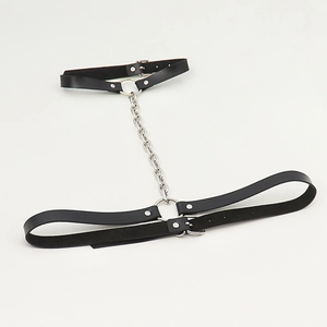 Detailed view of punk black leather body chain with adjustable silver metal buckles
