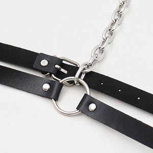 Sexy punk style black leather body chain with silver metal rings and rugged chains