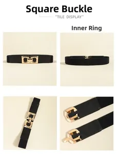 Detail view of black elastic waist belt featuring a gold square interlocking buckle
