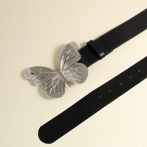 Ceinture chic en cuir PU noir avec boucle papillon en métal argenté poli pour tailleurs