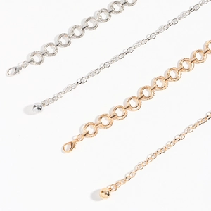 Chic metallic chain belt set in gold and silver finish for dresses and street style