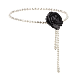 Elegant pearl waist chain featuring a black camellia flower and hanging fringe accents