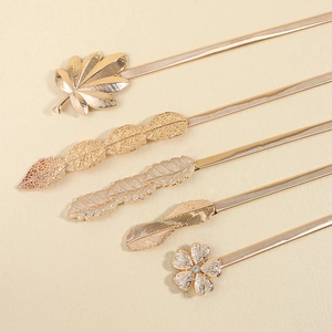Elastic gold metal leaf belts for women with rhinestone floral buckle and spring design