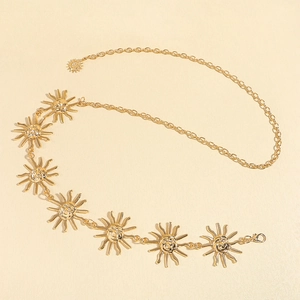 Close-up of golden sunflower waist chain with smiley faces and adjustable lobster clasp