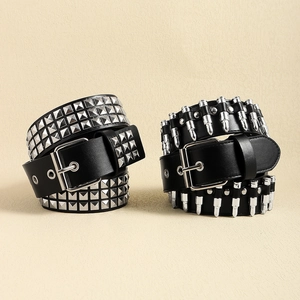 Y2K punk style black faux leather belt with silver square studs and bullet metal accents