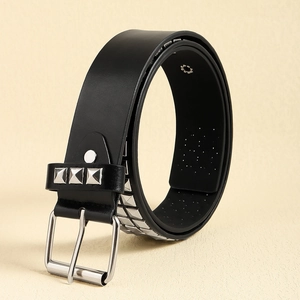 Close-up of black punk belt featuring silver square rivets and classic metal buckle