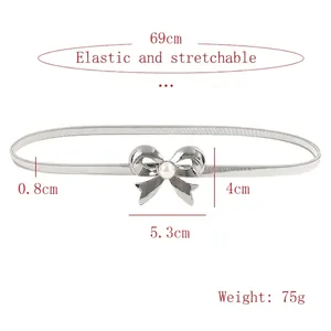 Silver metal elastic belt with bow buckle and pearl, sizing dimensions on white background