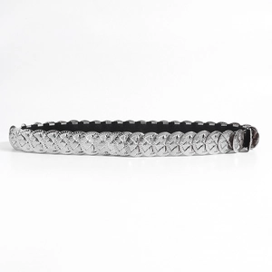 Elastic waist belt featuring silver round metal scales with radial patterns for women