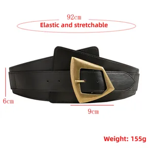 Detail showing a 6cm wide black elastic belt with 9cm golden geometric buckle for women