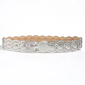 Detail of silver rivets and hollow patterns on a vintage Bohemian women belt