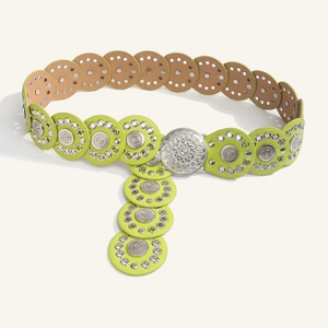 Detail view of lime green Y2K bohemian belt with silver rivets and metal buckle