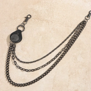 Detail of gunmetal multi-layer hip hop wallet chain with black leather badge and metal hooks
