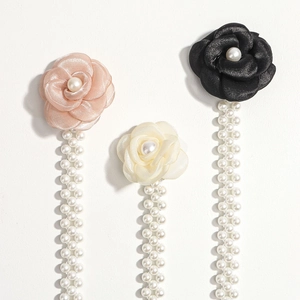 Elegant camellia pearl waist chain belt in white, pink, and black colors for dresses