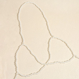 Elegante catena per il corpo in perle multistrato con girocollo e design intrecciato