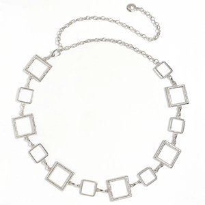 Detailed view of silver metal waist chain with textured square links and lobster clasp