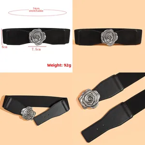 Détails de la ceinture corset élastique noire avec une grande boucle rose argentée