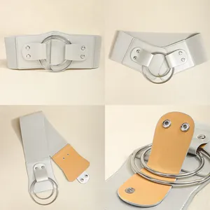 Détails de la ceinture élastique large avec doubles boucles argentées et rivets