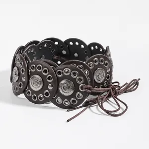 Vintage western rivet belt with brown round leather patches and embossed metal studs